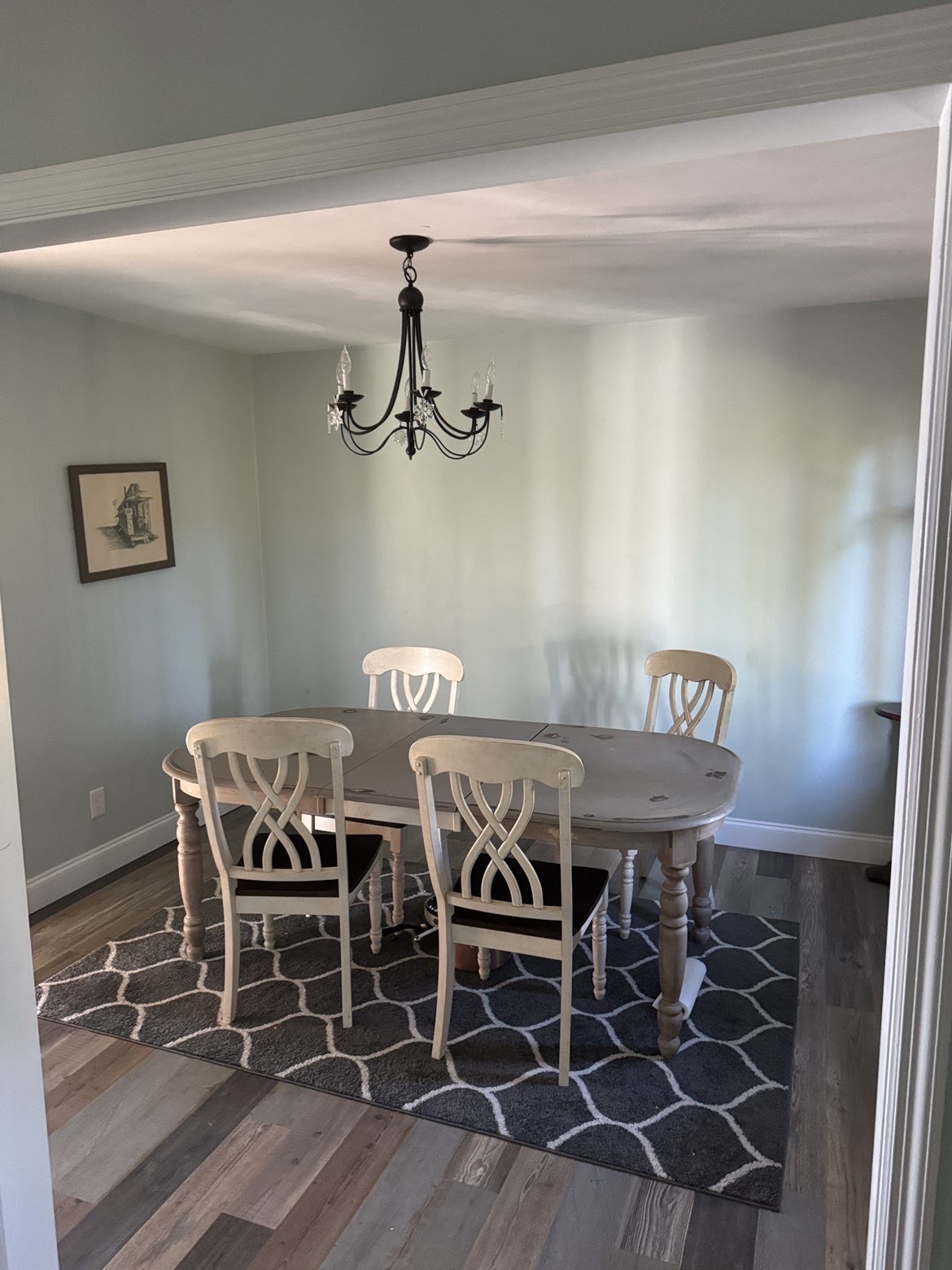 Dining room before: table and four chairs
